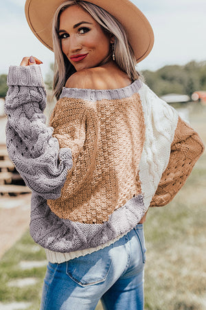 Snuggle Up In A Cable Knit Sweater